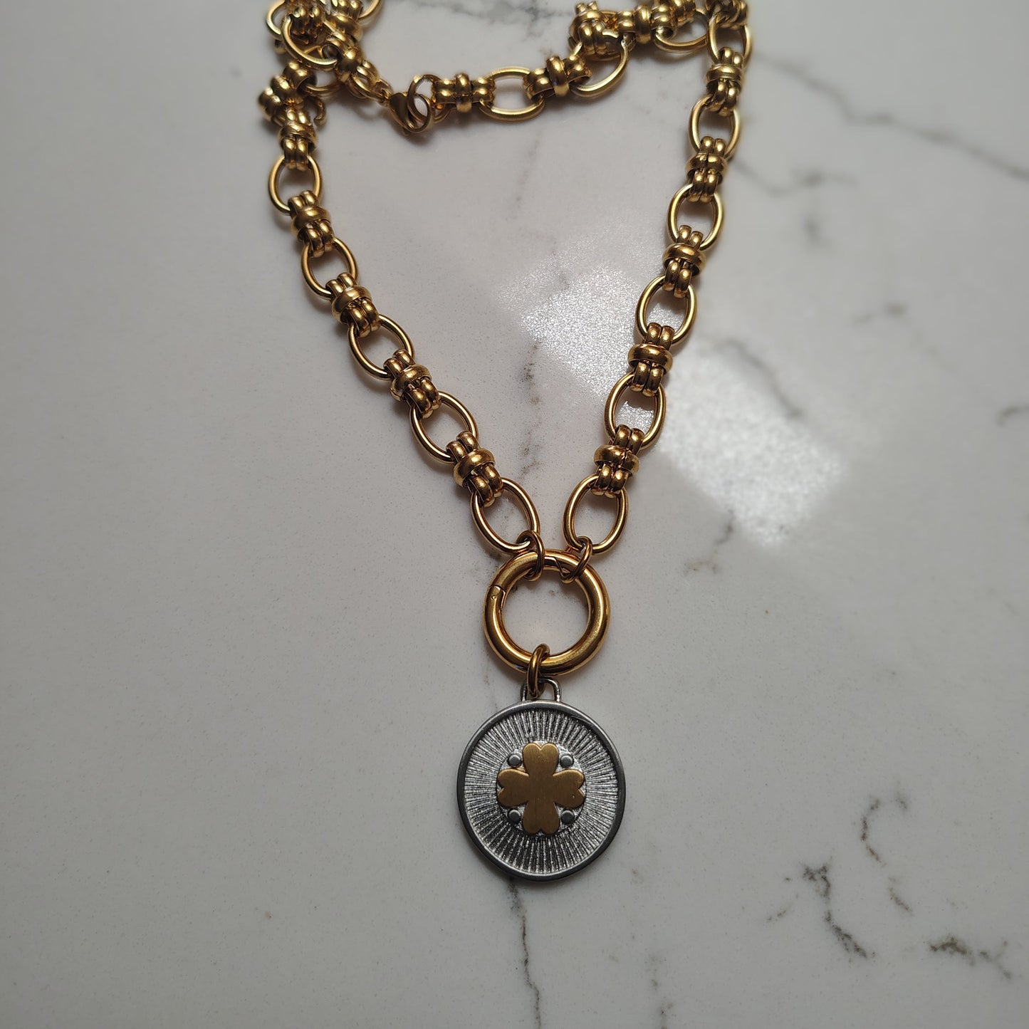 Clover pendant Gold on Silver