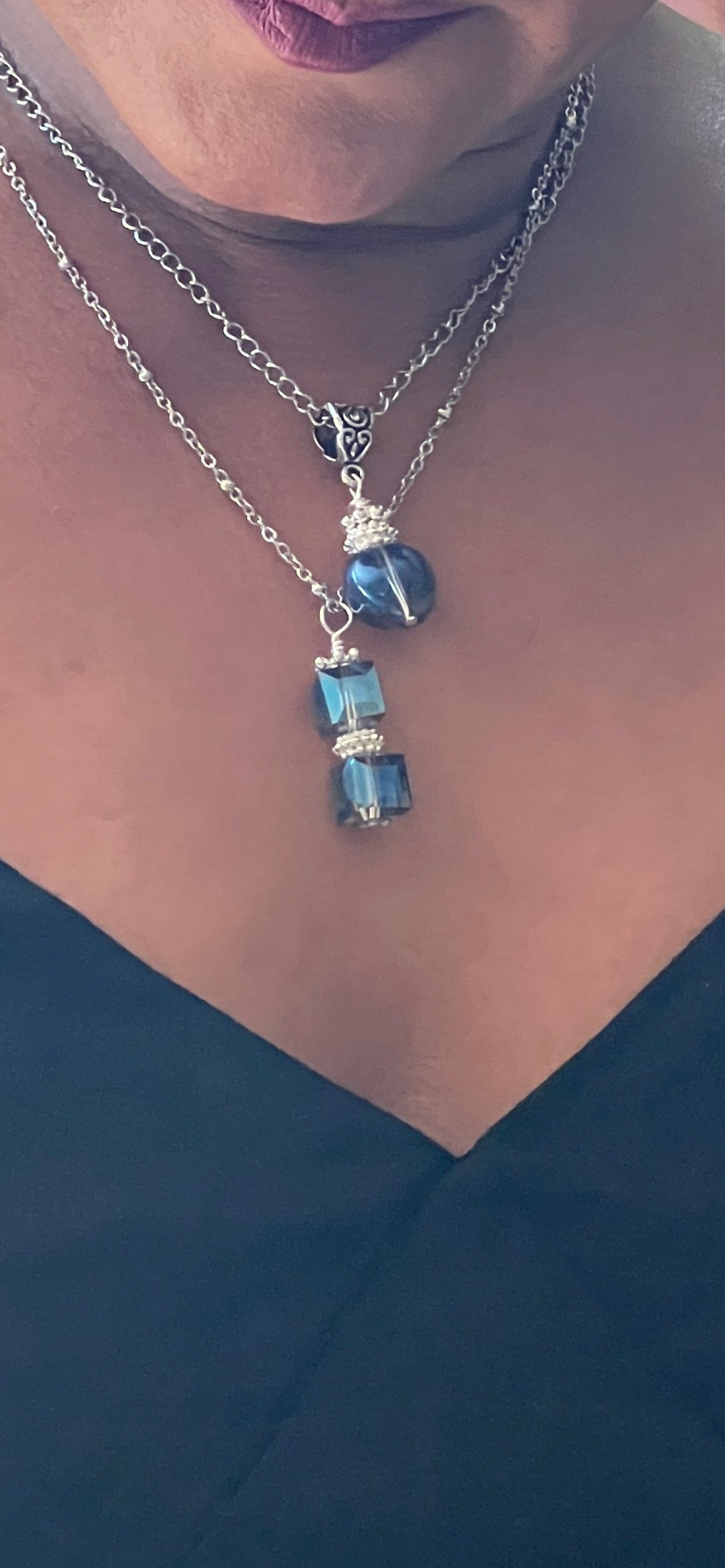 Ocean blue square shaped crystal pendant.